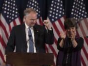 Democratic vice presidential candidate, Sen. Tim Kaine, D-Va., accompanied by his wife Anne Holton speaks in New York on Nov. 9.