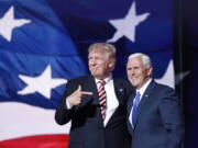 Republican presidential candidate Donald Trump, points toward Republican Vice presidential candidate Gov. Mike Pence of Indiana after Pence&#039;s acceptance speech during the third day session of the Republican National Convention in Cleveland, Wednesday, July 20, 2016.