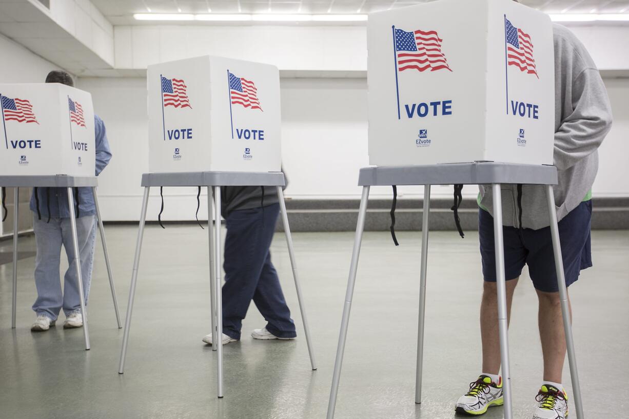 McCracken County residents vote at the Robert Cherry Civic Center in Paducah, Ky., Tuesday, Nov. 8, 2016.  Kentucky voters will have their say in a presidential race that has mostly bypassed the state. Republican voters selected Donald Trump and Democrats chose Hillary Clinton during the state's presidential caucus and primary earlier this year.