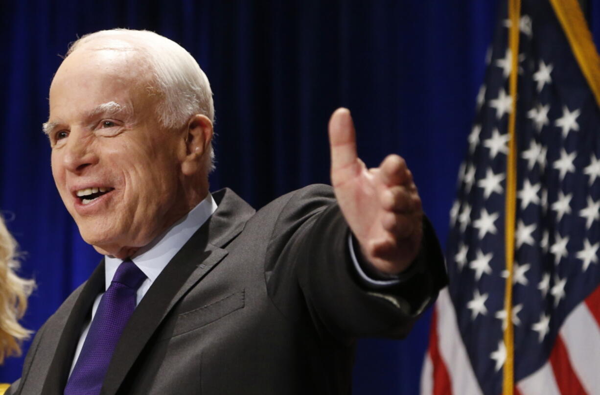 Sen. John McCain, R-Ariz., smiles as he thanks supporters after winning a sixth term Tuesday in Phoenix. He defeated Democratic challenger Rep. Ann Kirkpatrick. (Ross D.