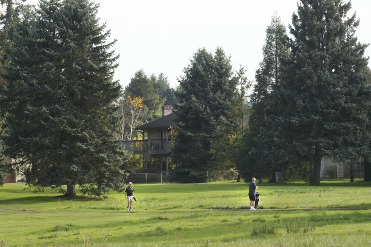 A home in the Green Meadows neighborhood sits on the edge of the Club Green Meadows golf course.