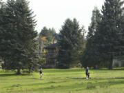 A home in the Green Meadows neighborhood sits on the edge of the Club Green Meadows golf course.