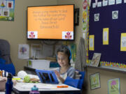 First-grader Rebeckah Pravettoni, 6, learns using a tablet at Cornerstone Christian Academy on Thursday morning.