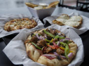 The General&#039;s pizza is served at The Blind Onion in Vancouver.