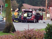 Police and fire personnel respond to a three-vehicle crash Wednesday afternoon in east Vancouver. An apparent medical problem sent one driver into oncoming traffic on Northeast 162nd Avenue, causing the crash.