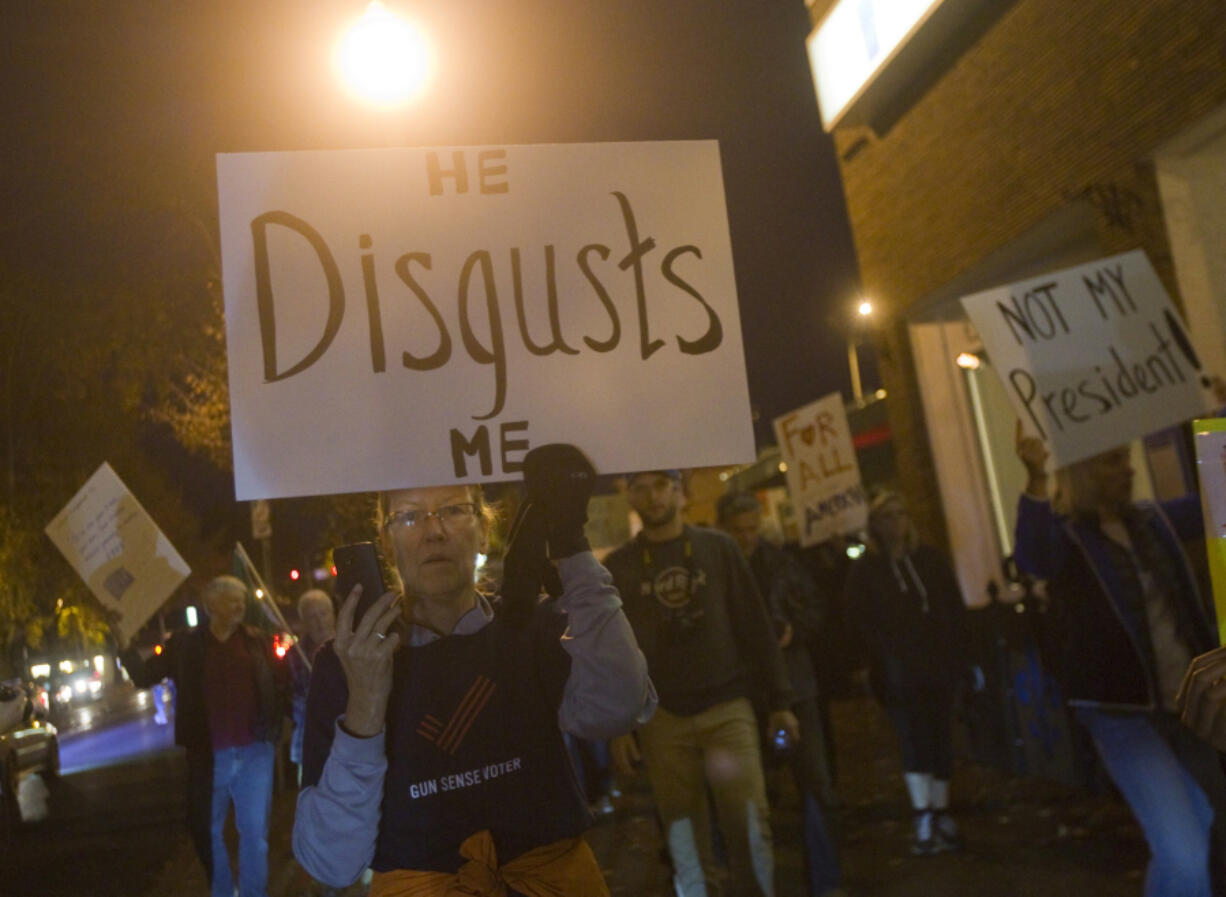 Joanne Pinelli is among roughly 75 people taking part in a Friday night protest in Vancouver against Donald Trump&#039;s presidential campaign rhetoric and win in Tuesday&#039;s election.