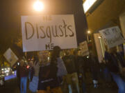 Joanne Pinelli is among roughly 75 people taking part in a Friday night protest in Vancouver against Donald Trump&#039;s presidential campaign rhetoric and win in Tuesday&#039;s election.