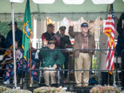 Veterans and their families wave as the Lough Legacy Veterans Parade at Fort Vancouver passes by in 2015. (Molly J.