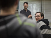 Architect Joe Echeverri from Bassetti Architects speaks to students earlier this month about designing a climbing tower at La Center High School. San Francisco-based general contractor Swinerton Builders pledged $80,000 to La Center High School to help build a climbing wall on the school grounds. Students are trying to raise an additional $20,000 for the project.