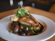 The Draper Valley chicken breast with fingerling potatoes, crimini mushroom, sweet onion, ham and chive hollandaise at Roots Restaurant and Bar in Vancouver, as seen Monday November 28, 2016.