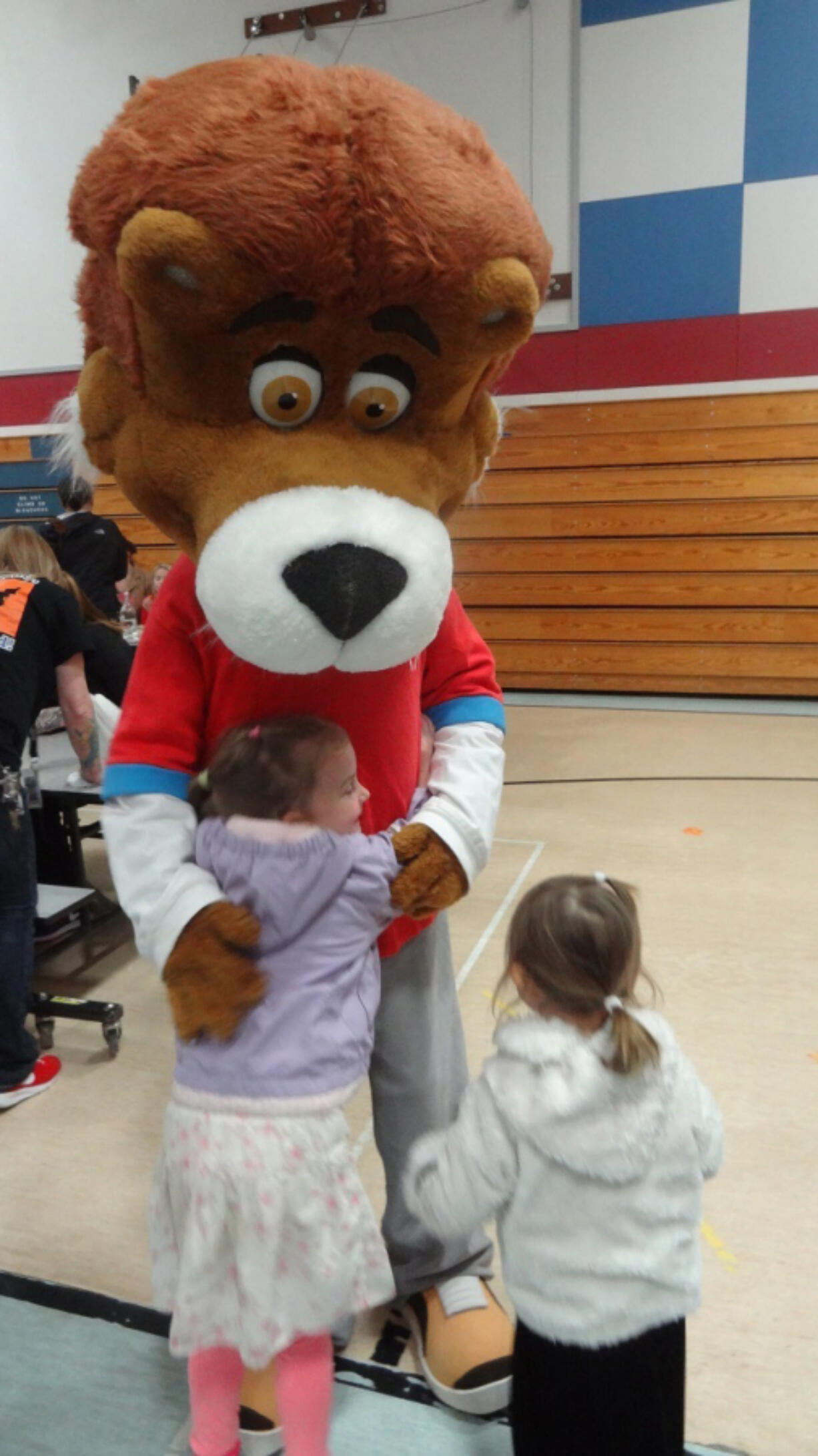 Ridgefield: A Ridgefield High School student dressed up as Lionel the Lion during the school district&#039;s annual Thanksgiving meal, when families are invited to schools to enjoy a lunch with students.