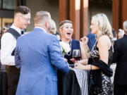 Esther Short: A table of guests at Windermere Stellar&#039;s fourth annual Children&#039;s Justice Center Gala Auction, which raised nearly $200,000 for the center and had an &quot;An Evening With The Great Gatsby&quot; theme.