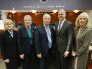 New county council members, Jeanne Stewart, Julie Olson, Marc Boldt, John Blom and Eileen Quiring gather after the county council meeting at the Clark County Public Service Building.