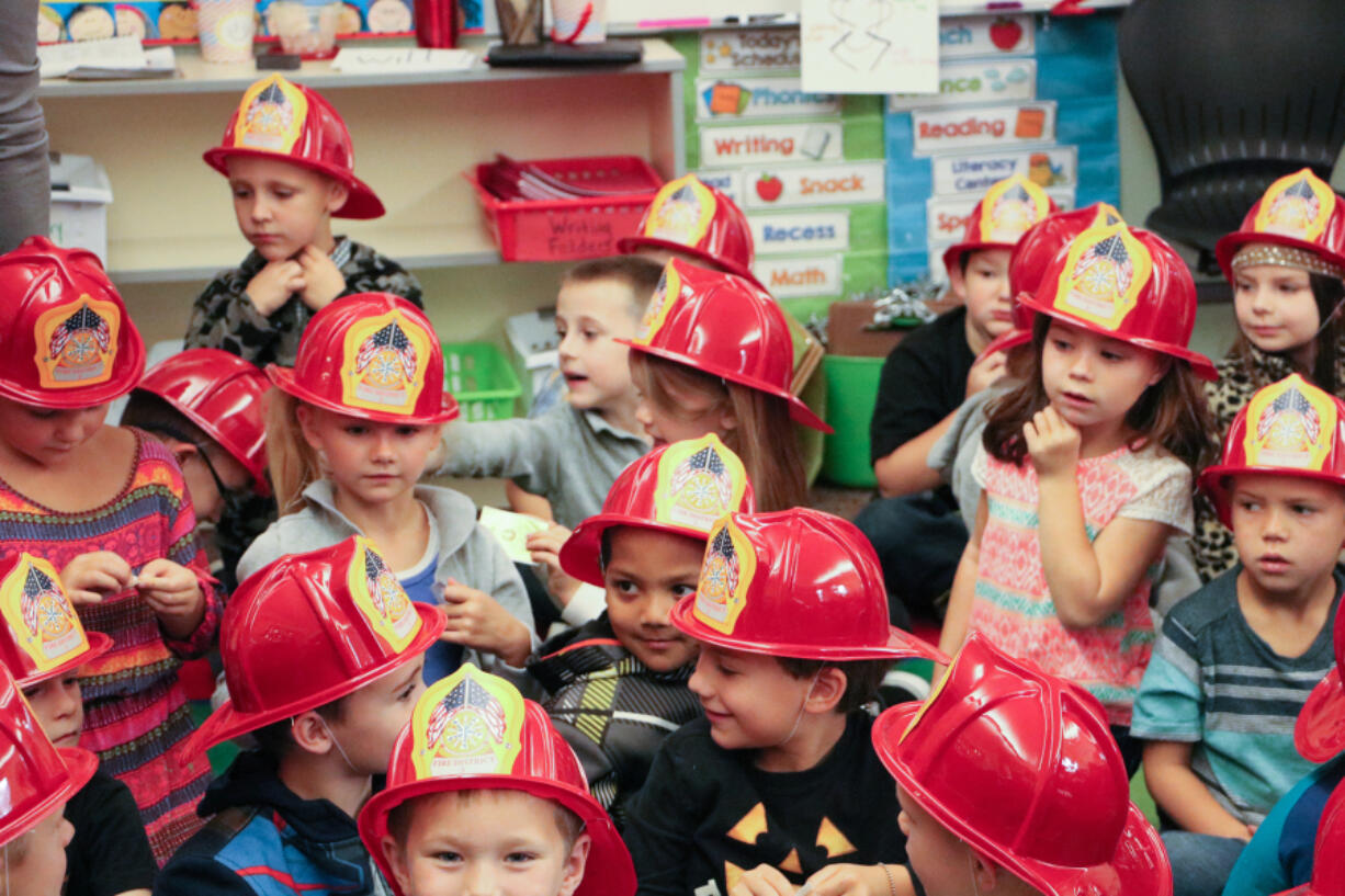 Battle Ground: Two Tukes Valley Primary School kindergarten classes learned about fire safety during a visit from some Clark County Fire District 3 firefighters.