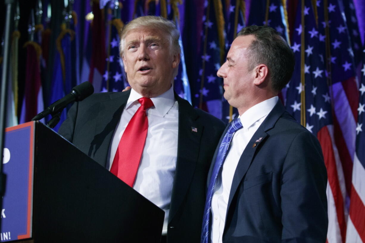 President-elect Donald Trump, left, stands with Republican National Committee Chairman Reince Priebus during an election night rally in New York. Trump on Sunday named Priebus as his White House chief of staff.