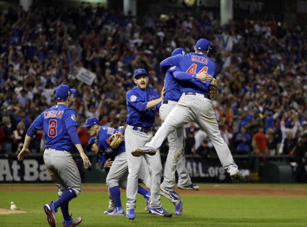 The Chicago Cubs celebrate after Game 7 of the Major League Baseball World Series against the Cleveland Indians Thursday, Nov. 3, 2016, in Cleveland. The Cubs won 8-7 in 10 innings to win the series 4-3. (AP Photo/David J.