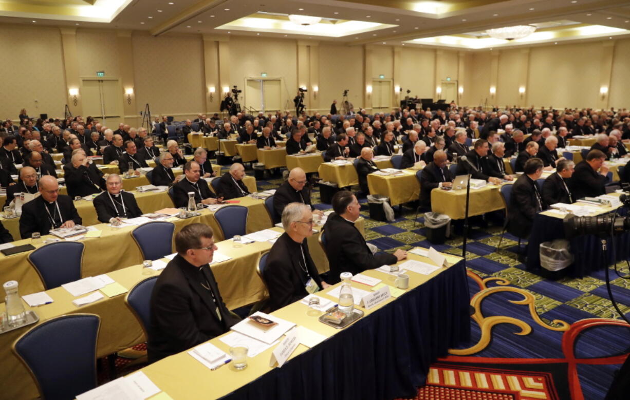 Members of the United States Conference of Catholic Bishops attend the USCCB&#039;s annual fall meeting in Baltimore on Monday. The bishops opened their meeting by urging President-elect Donald Trump to adopt humane policies toward immigrants and refugees.