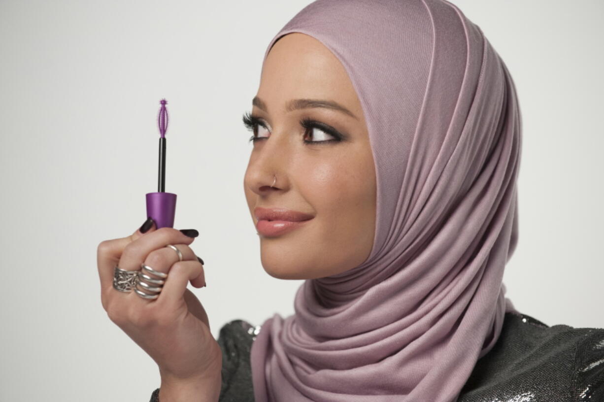 Beauty blogger Nura Afia poses for a photo. CoverGirl is featuring a woman wearing a hijab in its advertising for the first time in the makeup line&#039;s history.