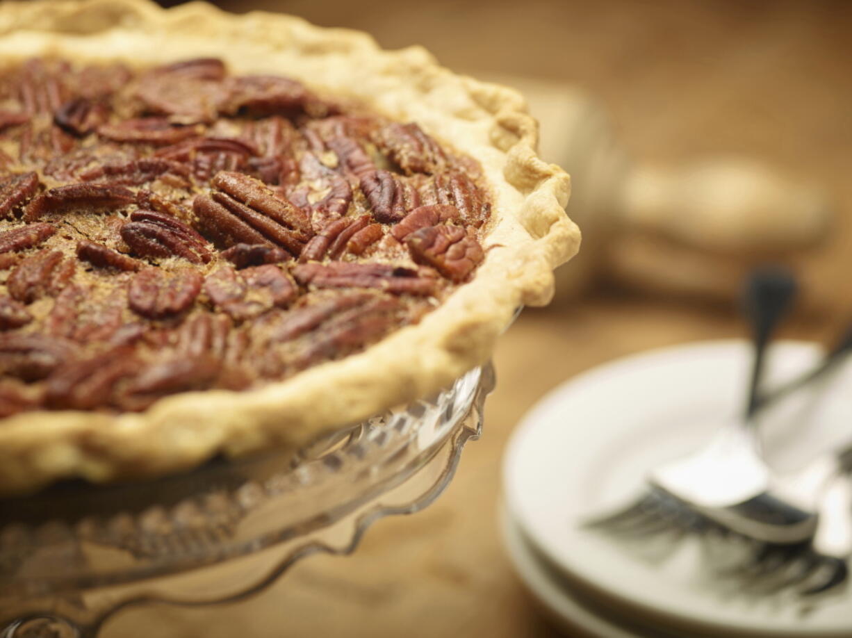 This Oct. 14, 2016 photo provided by The Culinary Institute of America shows pecan pie in Hyde Park, N.Y. This dish is from a recipe by the CIA.