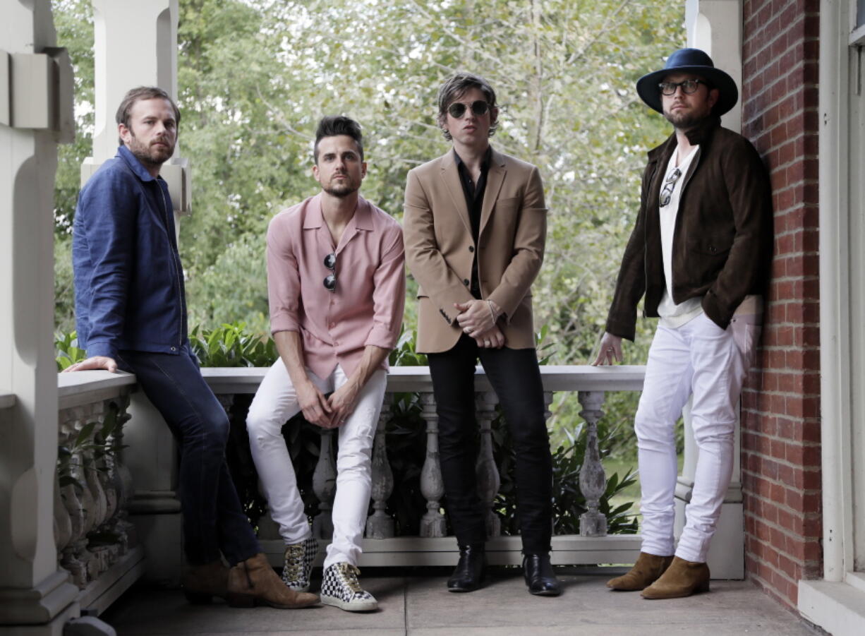 Kings of Leon, from left, Caleb Followill, Jared Followill, Matthew Followill and Nathan Followill pose to promote their album, &quot;Walls,&quot; in Nashville, Tenn. on Oct. 3, 2016.