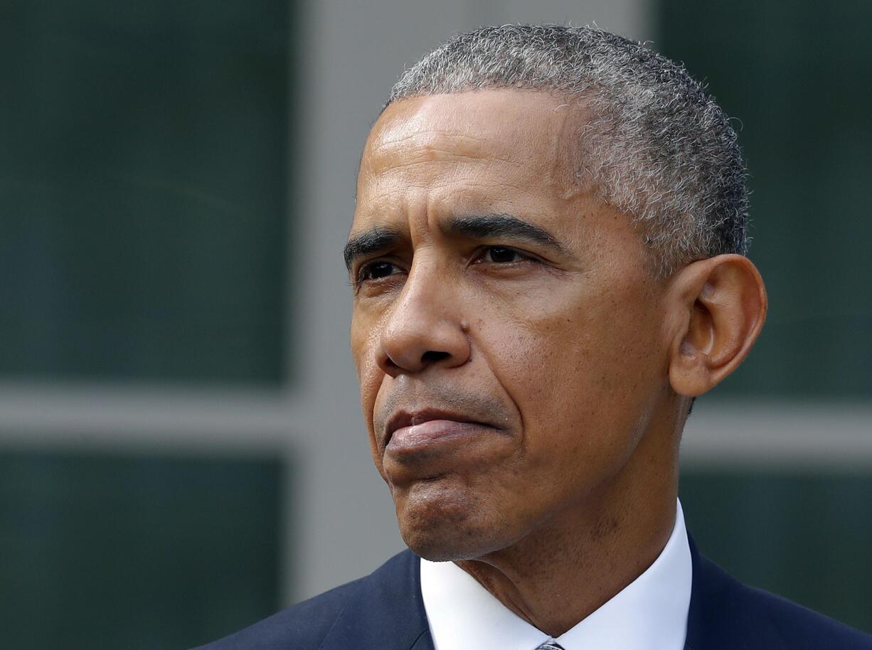 In this Nov. 9, 2016, photo, President Barack Obama pause while speaking in the Rose Garden of the White House in Washington. It was supposed to be his grand valedictory tour. Now Obama must use his last major trip abroad to try to calm shocked world leaders about the outcome of the U.S. election, and what comes next when Donald Trump is president.