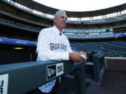 Newly named Colorado Rockies manager Bud Black poses for photographers on the diamond in Coors Field following a news conference to introduce him as the new skipper on Monday, Nov. 7, 2016, in Denver. Black succeeds Walt Weiss, who left after four seasons as manager at the conclusion of the regular season.