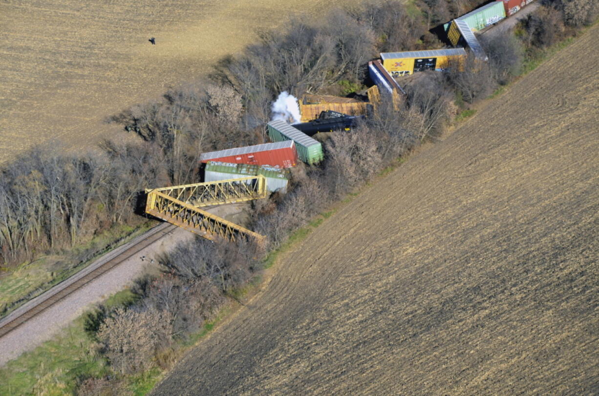 Several cars from a Union Pacific train are seen derailed near Ellendale, Minn., on Friday. The derailment and hazardous chemical spill prompted evacuations in the small southern Minnesota town and the closure of a state highway. No injuries were reported.