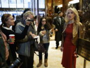 Kellyanne Conway, campaign manager and senior adviser to President-elect Donald Trump, talks with reporters as she arrives at Trump Tower, Sunday, Nov. 13, 2016, in New York.