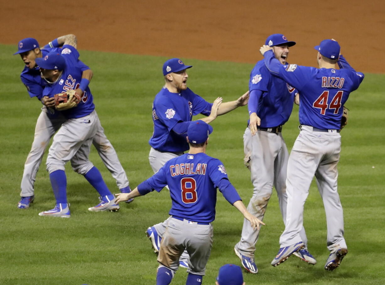 The Chicago Cubs celebrate after Game 7 of the Major League Baseball World Series against the Cleveland Indians Thursday, Nov. 3, 2016, in Cleveland. The Cubs won 8-7 in 10 innings to win the series 4-3. (AP Photo/Gene J.