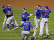 The Chicago Cubs celebrate after Game 7 of the Major League Baseball World Series against the Cleveland Indians Thursday, Nov. 3, 2016, in Cleveland. The Cubs won 8-7 in 10 innings to win the series 4-3. (AP Photo/Gene J.