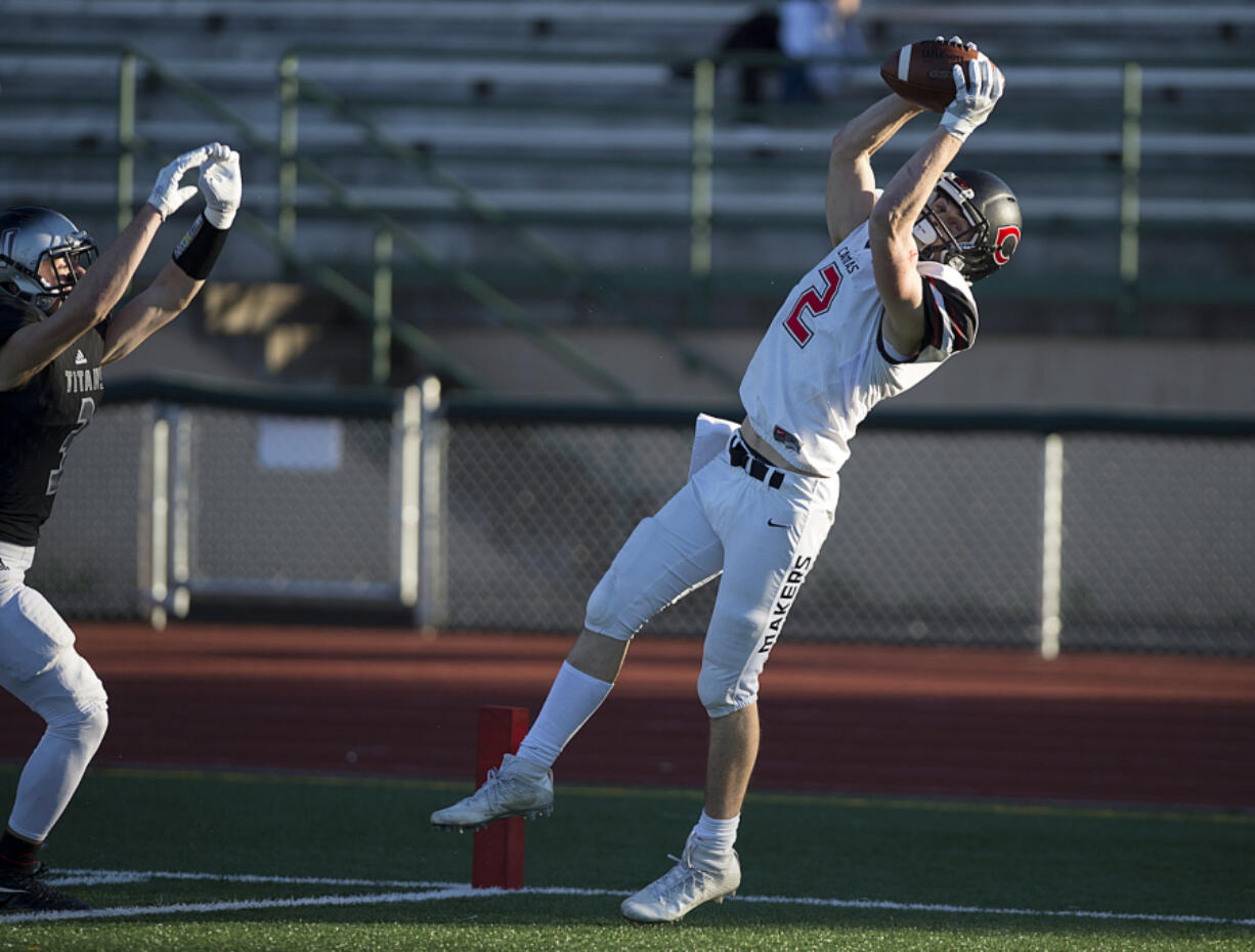 Camas&#039; Ryan Rushall (2), Cooper McNatt (15) and Drake Owen (21) create multiple targes for quarterback Jack Colletto on the Camas football team.