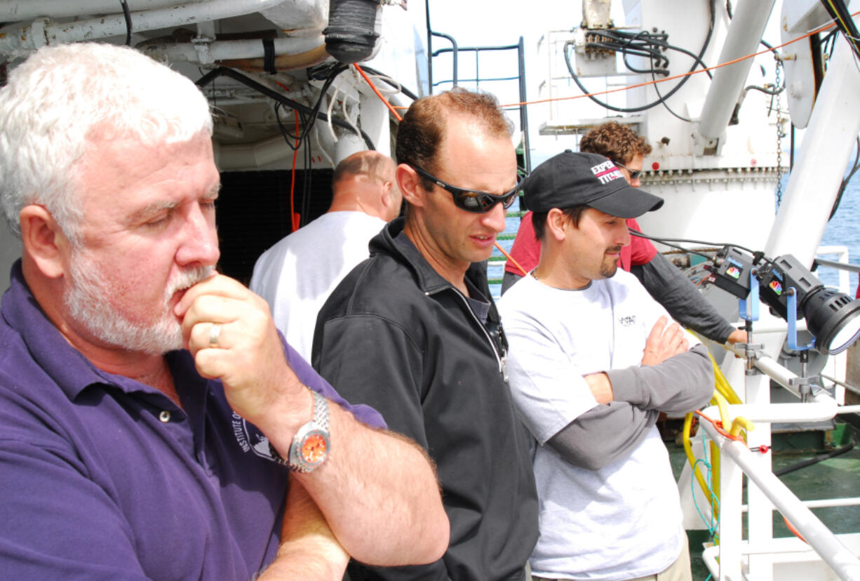 James Delgado, left, in 2010 on a research ship in the Atlantic, above the site of the wreckage of the Titanic.