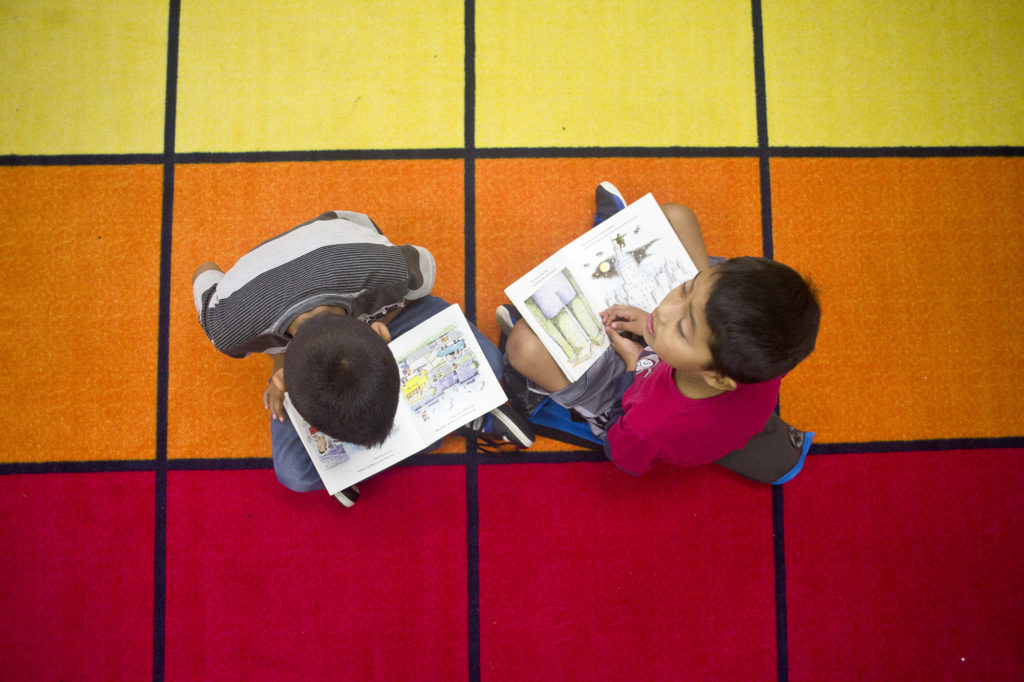 Alexander Lorenzo, left, 9, reads "The Gym Teacher from the Black Lagoon" to Christopher Lopez, 9, in Jennifer Crosby's third grade class at Woodland Intermediate School on Tuesday, October 25, 2016. Crosby and fellow third grade teacher, Megan Lascik, are giving students flexible seating options in class to help them learn more comfortably.