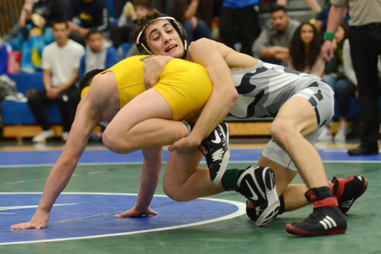 Union&#039;s Ethan Rotondo handles Burlington Edison&#039;s Isaac Lopez during the Pac-Coast wrestling tournament at Mountain View High School on Friday, December 30, 2016. Rotondo beat Lopez to win the 113-pound weight class.