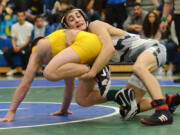 Union&#039;s Ethan Rotondo handles Burlington Edison&#039;s Isaac Lopez during the Pac-Coast wrestling tournament at Mountain View High School on Friday, December 30, 2016. Rotondo beat Lopez to win the 113-pound weight class.