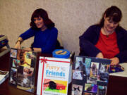 Ogden: Furry Friends volunteers Tonya Curtis and Julie Goldbeck, event chairwoman, wrap packages at Barnes and Noble before the holidays.