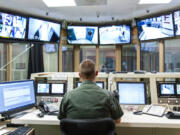 A corrections officer monitors security video feeds at the Clark County Jail. Although the county has worked to reduce the number of inmate deaths by suicide at the jail, by raw numbers, Clark County&#039;s jail has seen more inmate suicides over the past several years than any in the state.