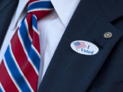 A sticker on his lapel proclaims that Clark County Auditor Greg Kimsey voted Nov. 8.