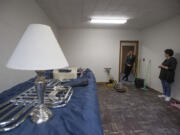 Share Deputy Director Amy Reynolds, left, talks with parishioner Deb Stavig in one of the four rooms under renovation for the Women&#039;s Housing and Transition, or WHAT, shelter at St. Luke&#039;s Episcopal Church.