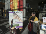 Vancouver resident Carmen Weninger looks over the Bill of Rights display at the Vancouver Community Library on Tuesday morning.