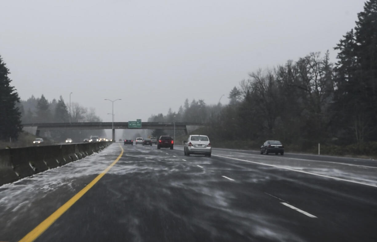 Snow blows across Highway 14 between Camas and Vancouver Wednesday afternoon.