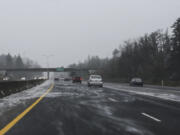 Snow blows across Highway 14 between Camas and Vancouver Wednesday afternoon.