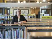 Amelia Shelley, pictured in the children's section of the Vancouver Community Library in April, is the Fort Vancouver Regional Library's executive director.