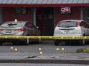 Crime scene markers are seen at the scene of a shooting at QuarterDeck Bar on Thursday morning, Dec. 1, 2016.