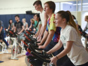 Woodland High School sophomore Ashley Yoder participates in one of three spin classes offered at the school. School officials have wanted to bring the physical education class to Woodland for years and were able to when the new high school opened in 2015.