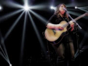 Amber Sweeney is inspired by the bluesy singing and slide guitar of Bonnie Raitt and the song writing of Sheryl Crow.