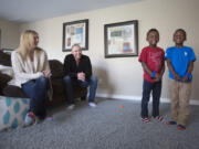 Brothers Jaxson, left, and Jameson Lyons of Camas, both 6, were adopted four years ago from the Democratic Republic of Congo.