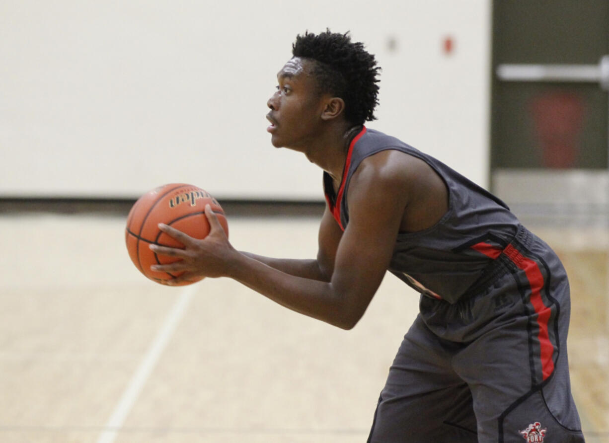 Fort Vancouver guard Miracle Alford-Lewis looks to pass against King's Way Christian.