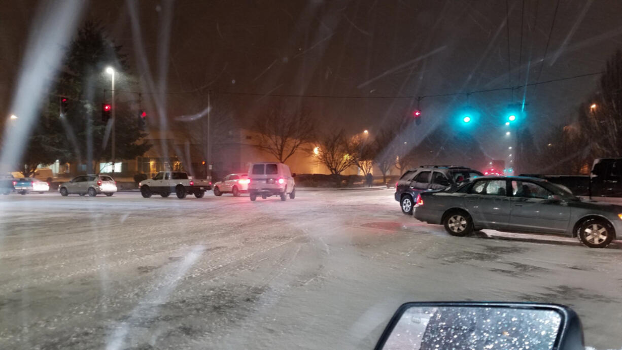 Tim Baker said it took him six and a half hours to travel from Clackamas, Ore., to Vancouver on Wednesday evening, and much of that time was spent on Airport Way. This was his view as he waited at least an hour to turn onto Northeast Airport Way from 138th Avenue in Portland.