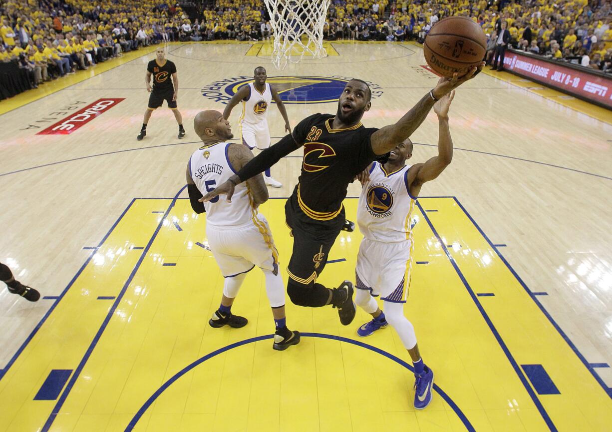 Cleveland Cavaliers forward LeBron James (23), who ended 52 years of sports heartache by bringing Cleveland a championship and used his superstar platform to address social causes, was chosen as The Associated Press 2016 Male Athlete of the Year.